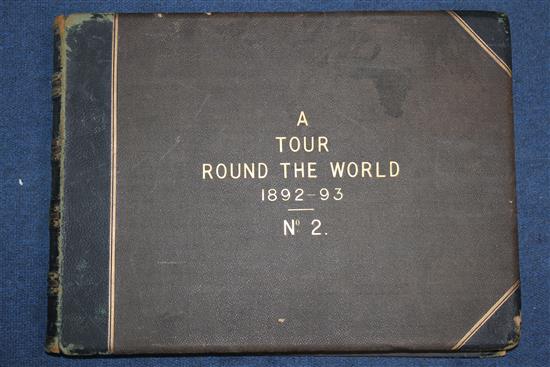 A World Tour photograph album, 17 x 12.5in.